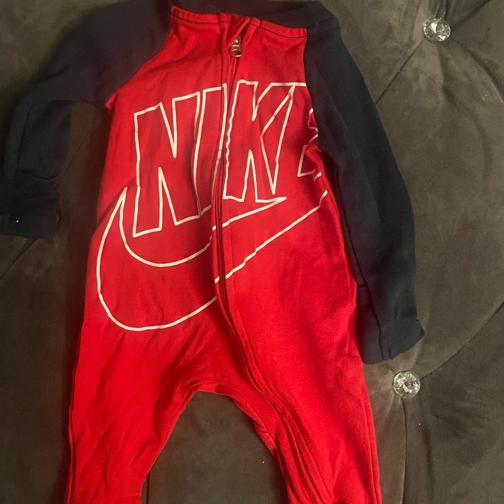 Nike footie one piece size newborn